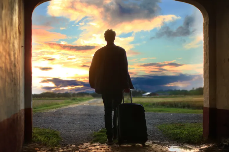 Traveler at sunrise