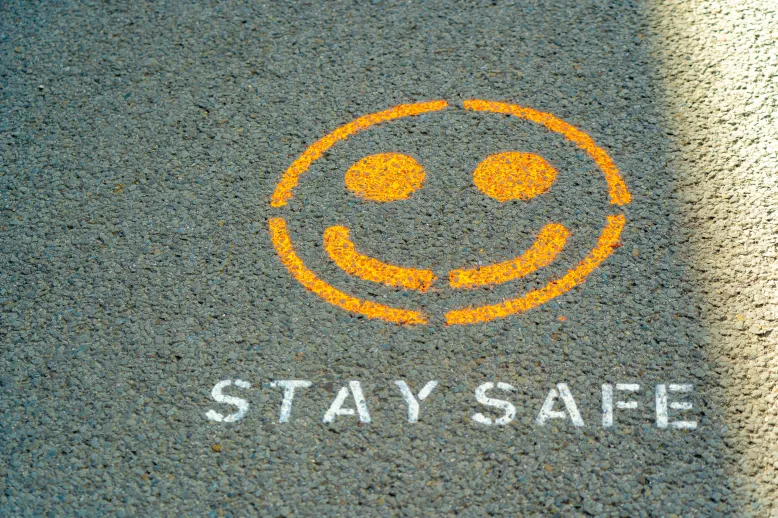 "Stay safe" on painted on pavement