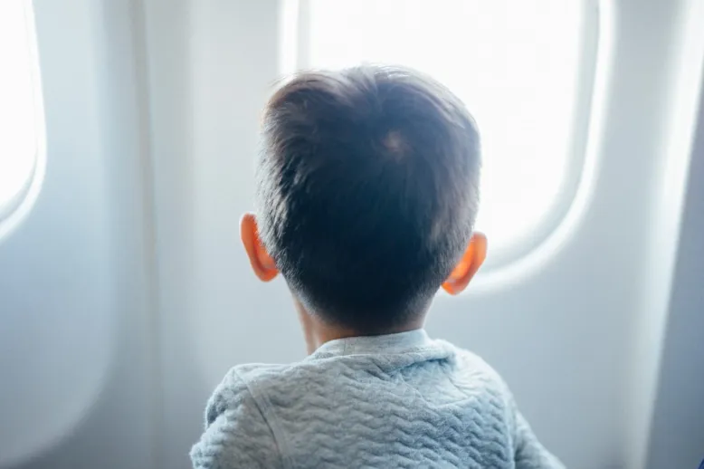 Minor on airplane