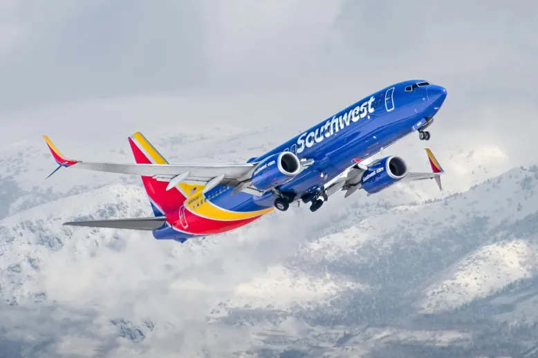 Southwest plane above mountains