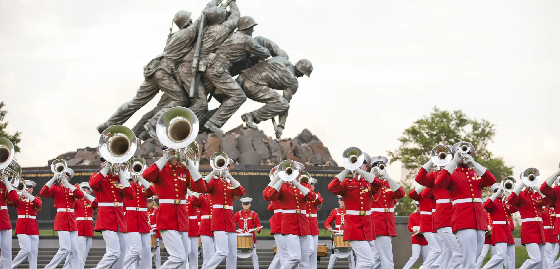 Members of the u.s. marine corps drum and bugle corps perform during the sunset parade june 18 2013 at the marine corps war memorial in arlington va 130618 m ks211 020