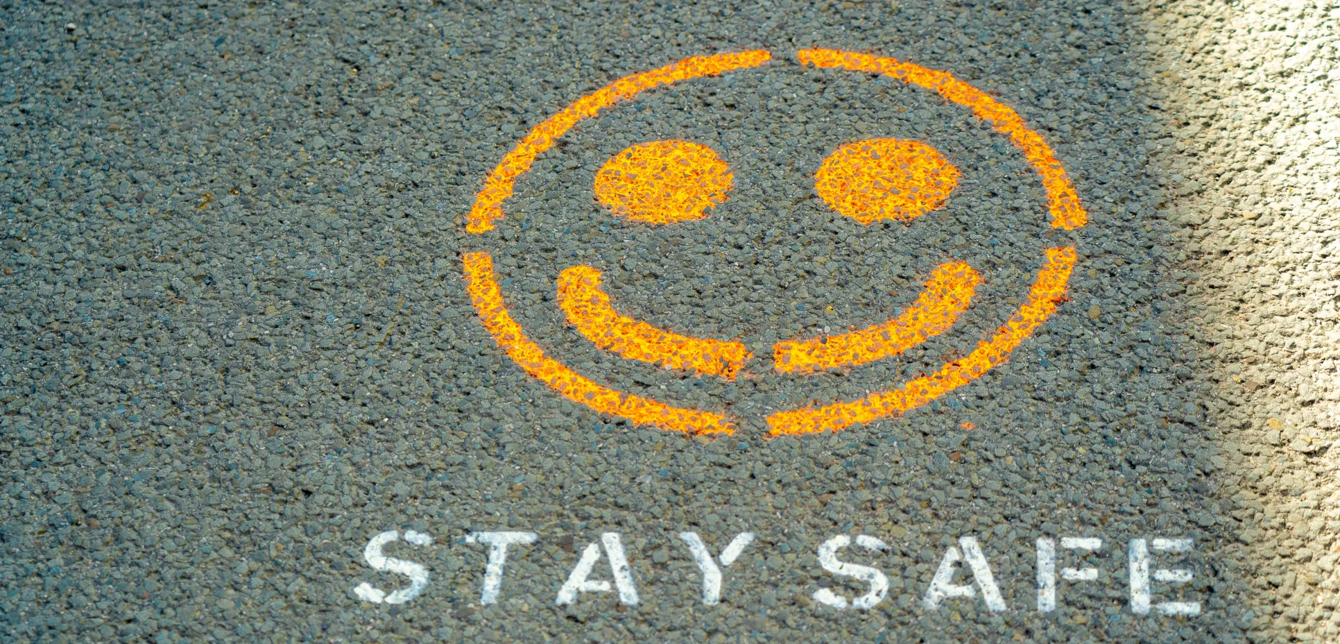 "Stay safe" on painted on pavement
