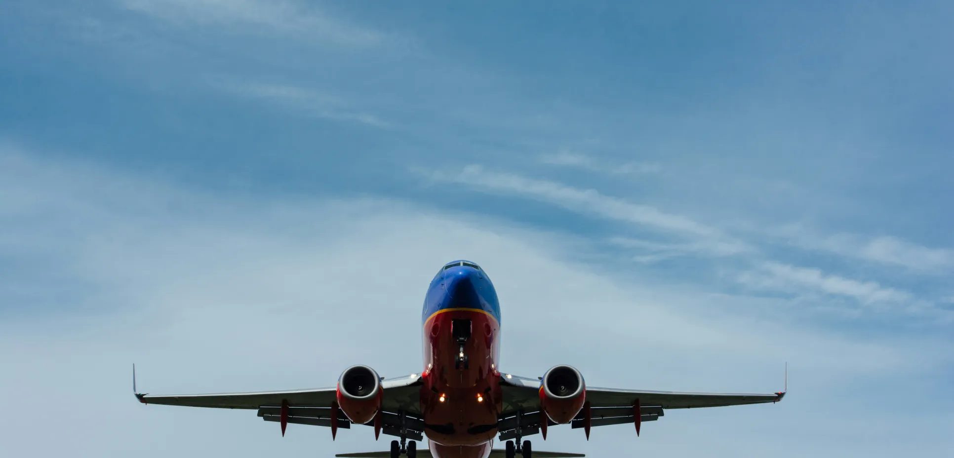 Under airplane flying in air