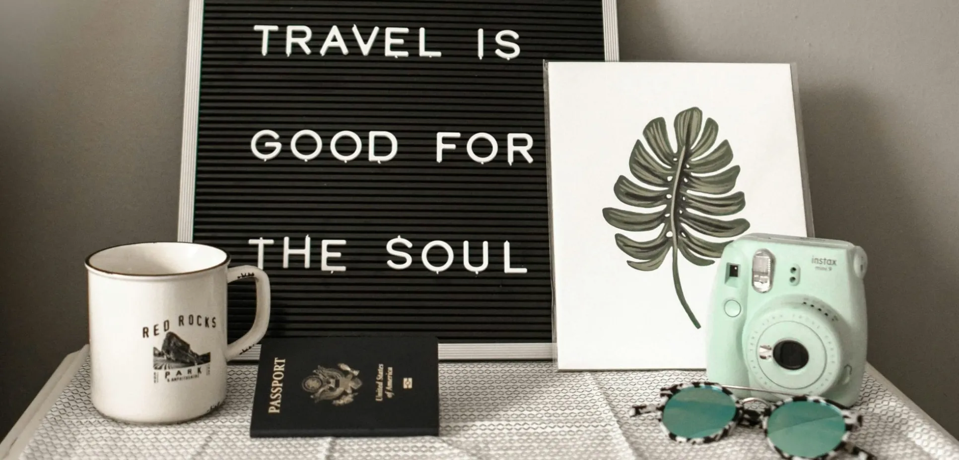 "Travel is good for the soul" sign