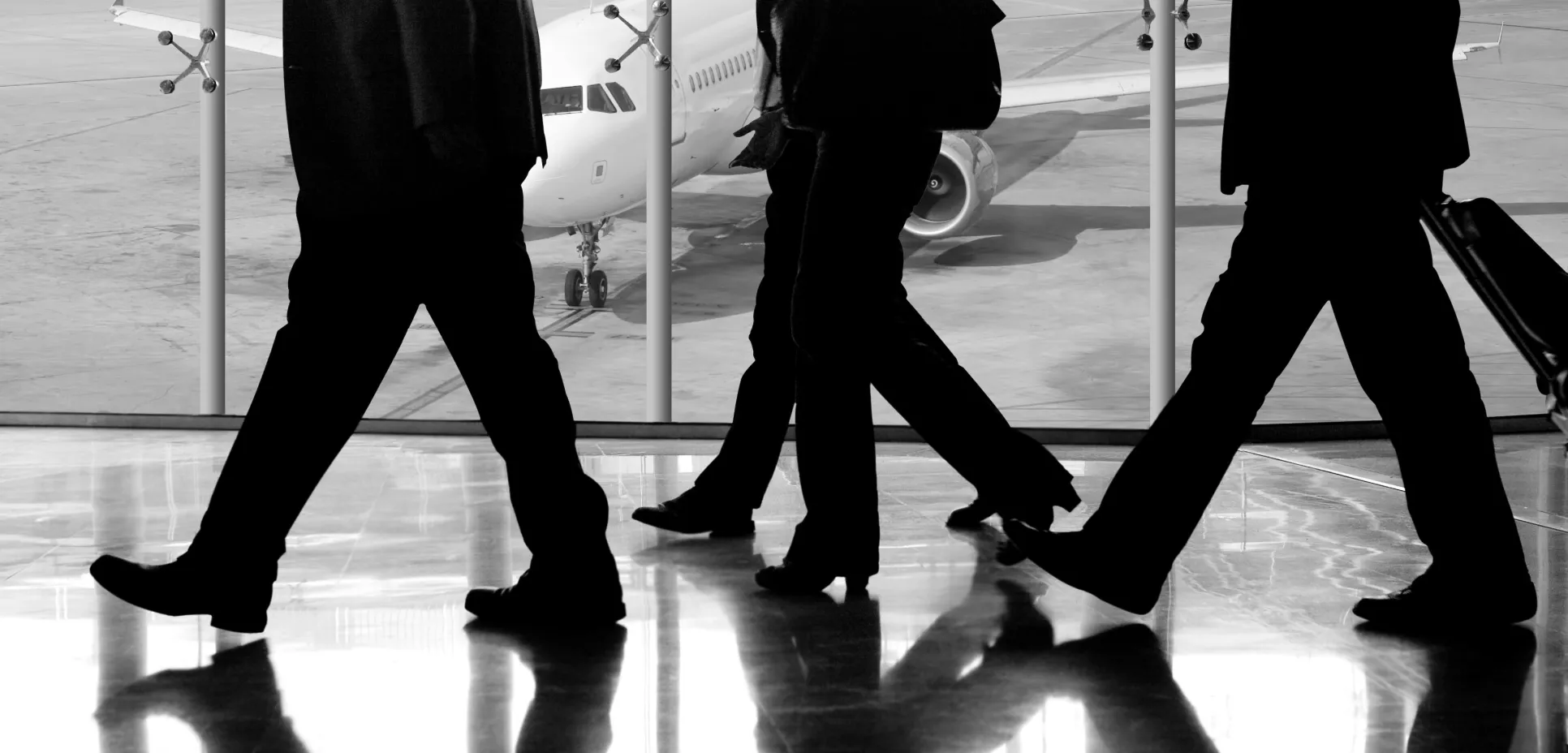 Business suits at airport