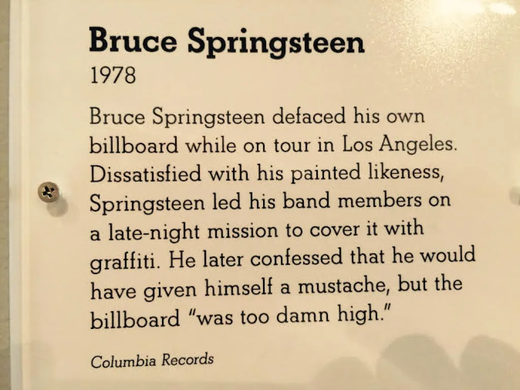 Bruce springsteen defacing own billboard plaque